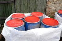 Obsolete Pesticides Repacked for Disposal